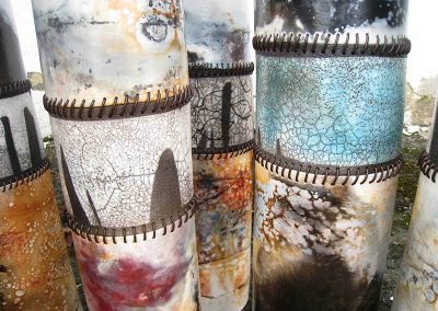 Three Ceramic Piece Tall As A Cylinder, Of Various Colors